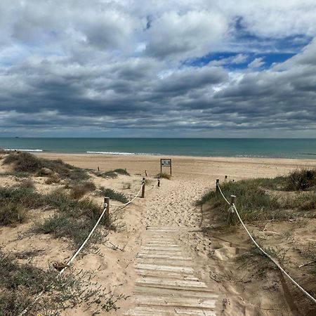 Chalet Adosado En La Playa De El Perellonet Con Piscina, Pista Tenis Valencia Eksteriør bilde